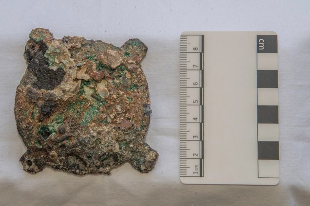 The strange metal disc pulled from the wreck. (Image: Brett Seymour/EUA/ARGO 2017)